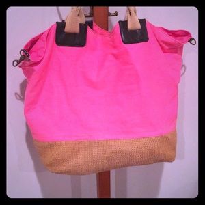 Pink tote bag with straw bottom